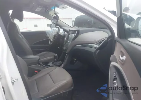 2014 Hyundai Santa Fe Sport 2.4L z USA, uszkodzony, nr VIN 5XYZUDLB7EG219362